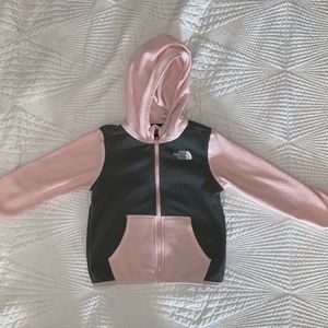 Pink and grey sweater size18-24 months used has a little stain on the right side